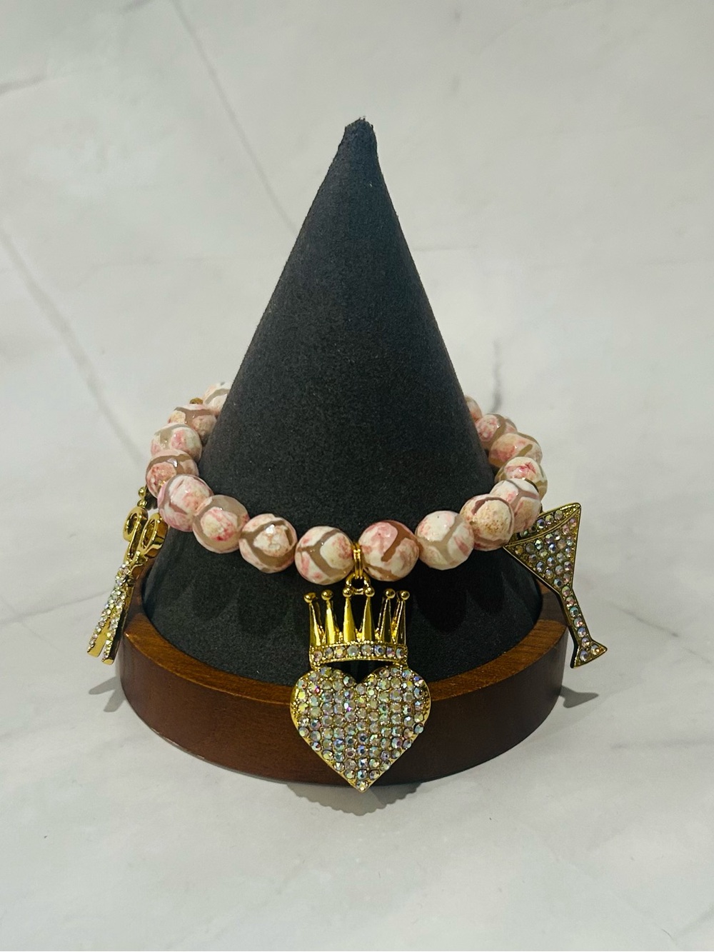Beaded Pink Tibetan bracelet with accent gold crystal charms